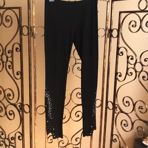 Black leggings with design at bottom of legs